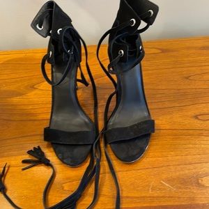 Rebecca Minkoff black suede high heeled gladiator sandals.
